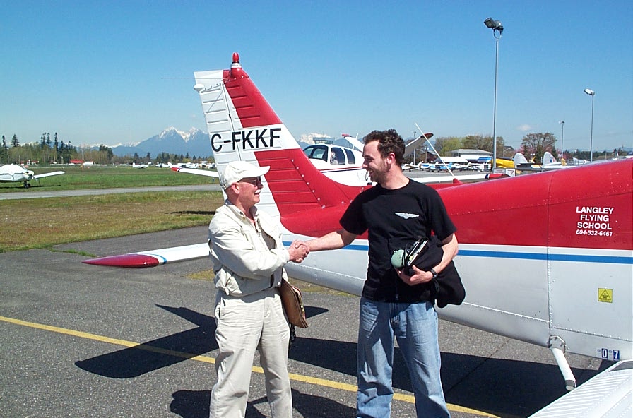 Steve Marsh with Pilot Examiner Donn Richardson after the completion of Steve's Private Pilot Flight Test.  Langley Flying School.